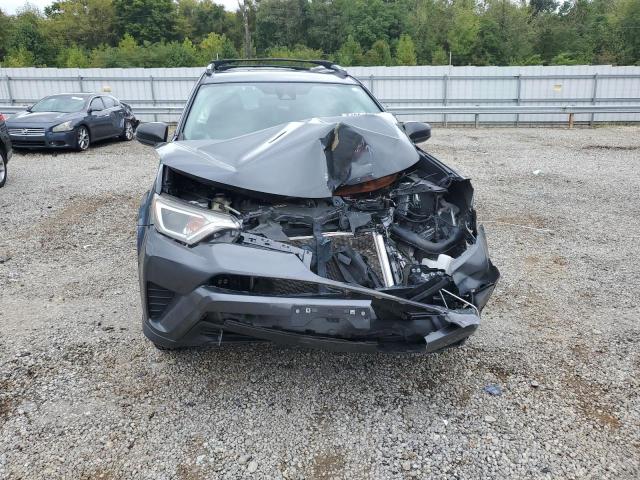Photo 5 from auction – 2018 TOYOTA RAV4 LE with VIN JTMZFREV7JD130611