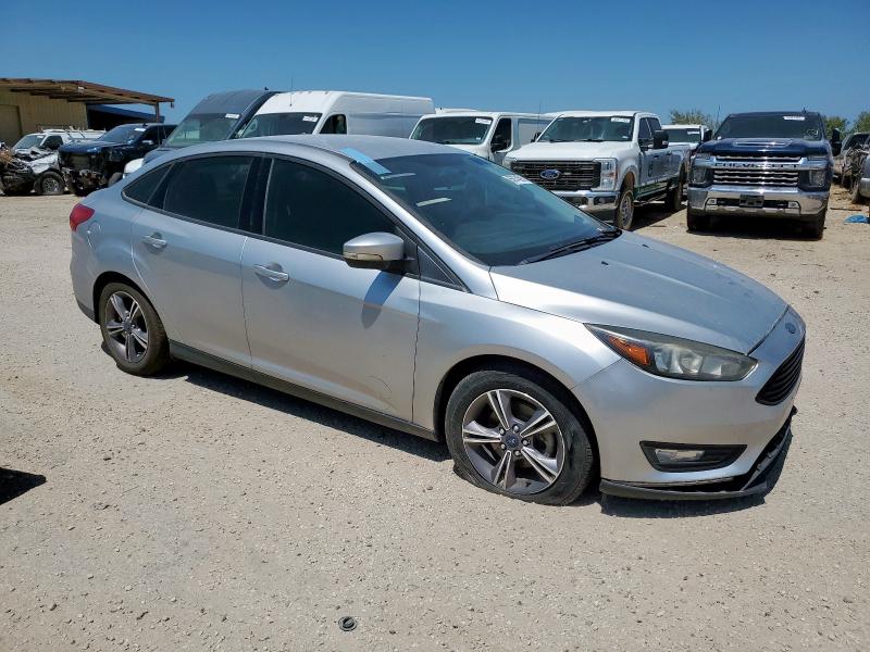 Photo 4 from auction – 2017 FORD FOCUS SE with VIN 1FADP3FE5HL292651