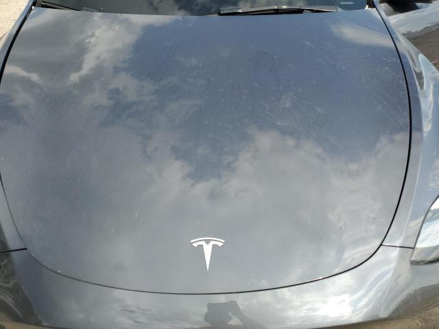 Photo 12 from auction – 2021 TESLA MODEL Y with VIN 5YJYGDEE1MF120679
