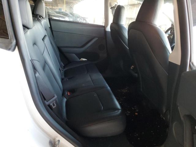 Photo 11 from auction – 2022 TESLA MODEL Y with VIN 7SAYGDEE7NA015923