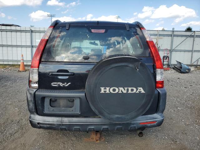 Photo 6 from auction – 2005 HONDA CR-V LX with VIN JHLRD68595C004233