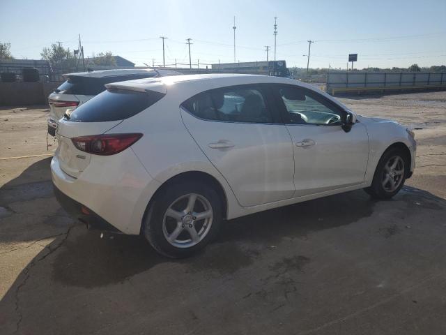 Photo 3 from auction – 2014 MAZDA 3 TOURING with VIN JM1BM1L79E1101373