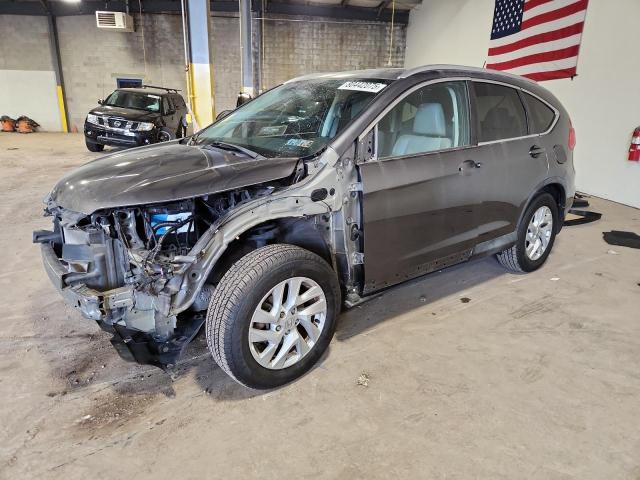 Photo 1 from auction – 2015 HONDA CR-V EXL with VIN 2HKRM4H79FH673899