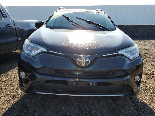Photo 5 from auction – 2017 TOYOTA RAV4 XLE with VIN 2T3WFREV1HW330805