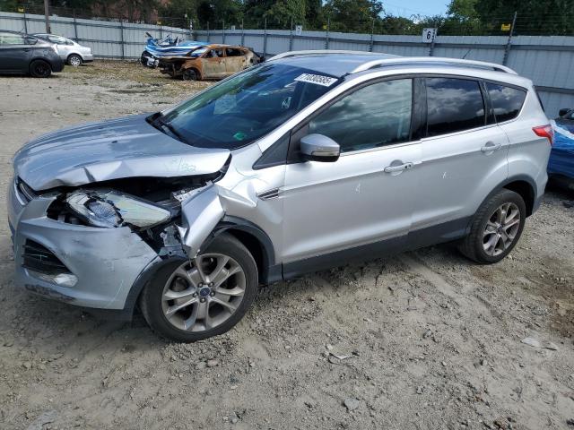FORD ESCAPE TIT 2014 with VIN 1FMCU0J99EUE07860 - Photo from auction