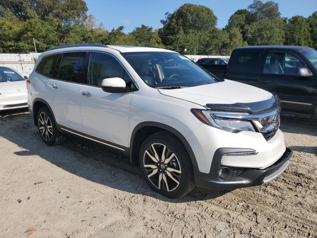 Photo 4 from auction – 2022 HONDA PILOT ELIT with VIN 5FNYF6H02NB026388