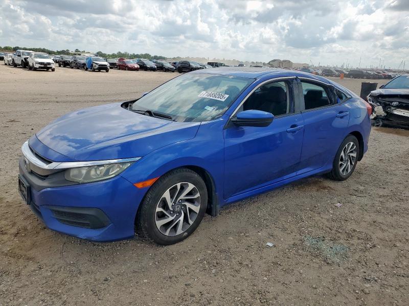 HONDA CIVIC EX 2018 with VIN 19XFC2F72JE018428 - Photo from auction