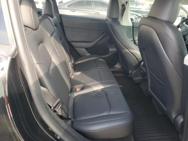 Photo 11 from auction – 2023 TESLA MODEL Y with VIN 7SAYGDEF9PF833099