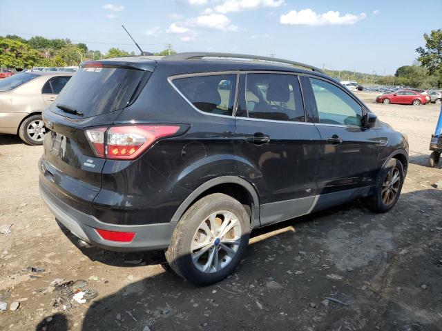 Photo 3 from auction – 2017 FORD ESCAPE SE with VIN 1FMCU9G95HUD03043