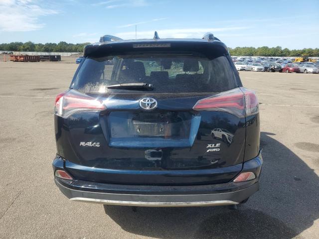 Photo 6 from auction – 2017 TOYOTA RAV4 XLE with VIN JTMRFREV5HD210578