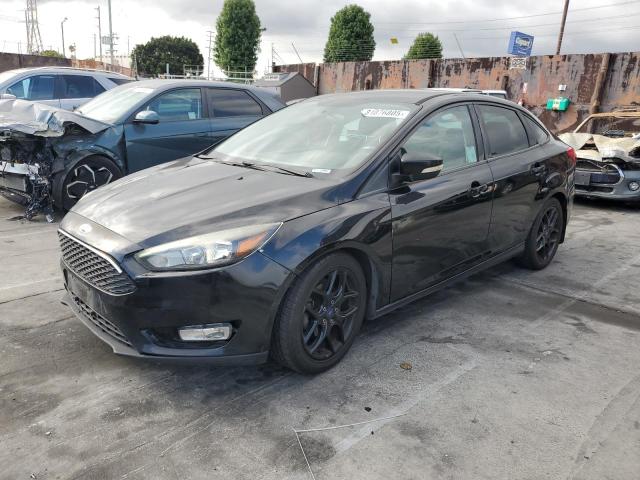 FORD FOCUS SE 2016 with VIN 1FADP3F24GL203284 - Photo from auction