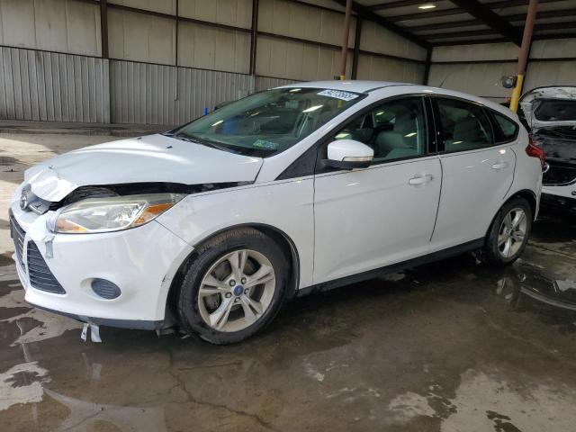 FORD FOCUS SE 2014 with VIN 1FADP3K29EL313864 - Photo from auction