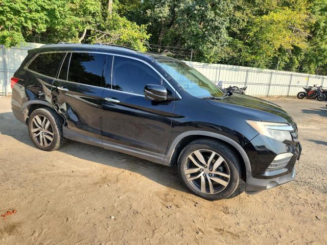 Photo 4 from auction – 2016 HONDA PILOT TOURING with VIN 5FNYF6H95GB004841