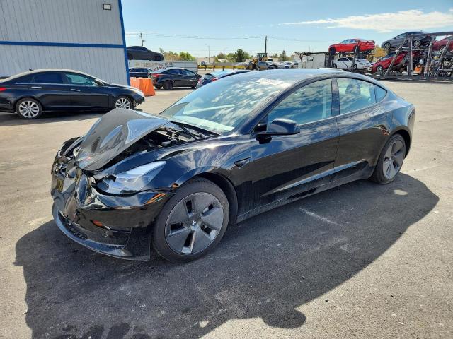 TESLA MODEL 3 2021 with VIN 5YJ3E1EAXMF875714 - Photo from auction