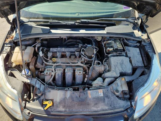 Foto 11 de la subasta – 2014 FORD FOCUS SE con VIN 1FADP3F21EL455460