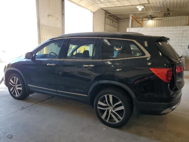 Photo 2 from auction – 2016 HONDA PILOT TOUR with VIN 5FNYF5H93GB033457
