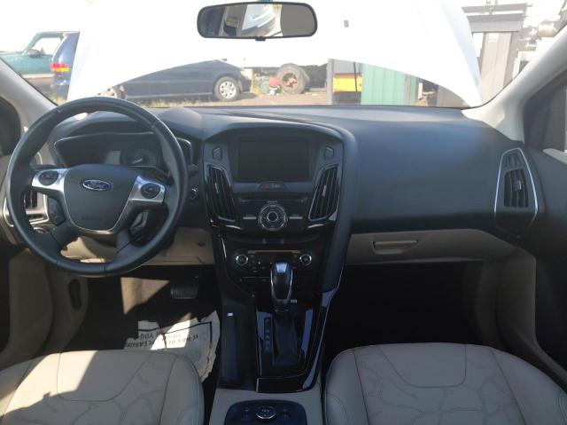 Photo 9 from auction – 2014 FORD FOCUS BEV with VIN 1FADP3R43EL342090