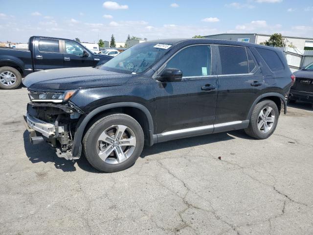 HONDA PILOT EXL 2023 with VIN 5FNYG2H45PB012268 - Photo from auction