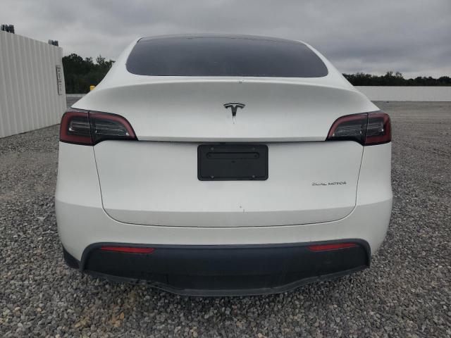 Photo 6 from auction – 2023 TESLA MODEL Y with VIN 7SAYGDEE7PF661825
