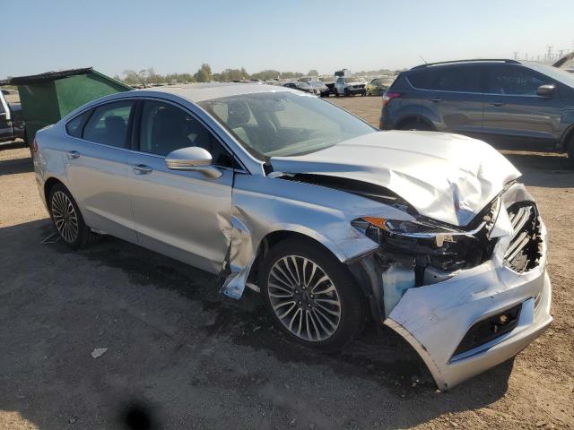 Photo 4 from auction – 2018 FORD FUSION TIT with VIN 3FA6P0D91JR128205