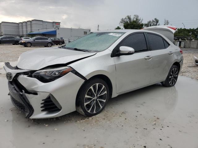 TOYOTA COROLLA L 2018 with VIN 5YFBURHE8JP776711 - Photo from auction