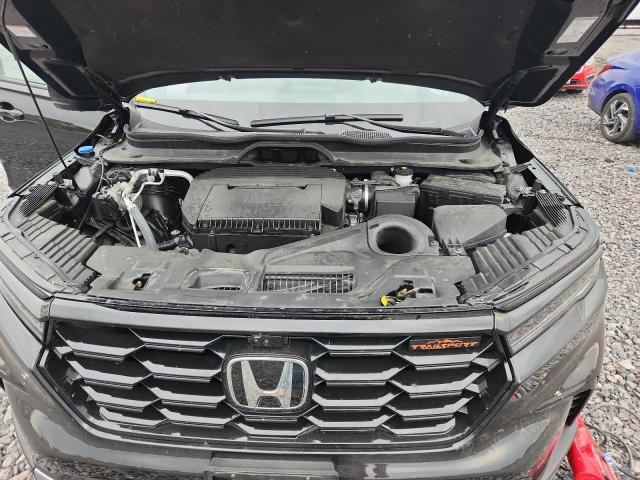 Photo 11 from auction – 2023 HONDA PILOT TRAI with VIN 5FNYG1H64PB046004