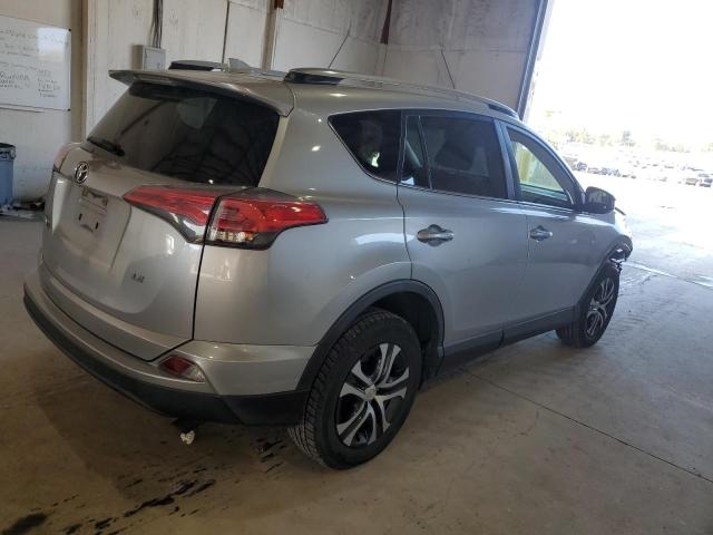 Photo 3 from auction – 2018 TOYOTA RAV4 LE with VIN JTMZFREV2JJ212540