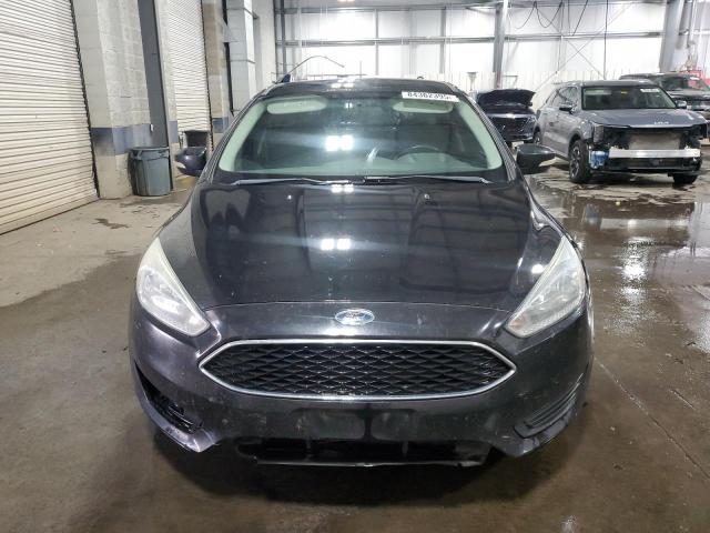 Photo 5 from auction – 2015 FORD FOCUS SE with VIN 1FADP3K20FL363795