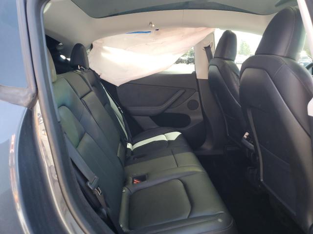 Photo 11 from auction – 2023 TESLA MODEL Y with VIN 7SAYGDEE0PA039788