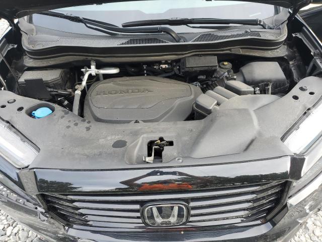 Photo 11 from auction – 2023 HONDA RIDGELINE with VIN 5FPYK3F83PB058697