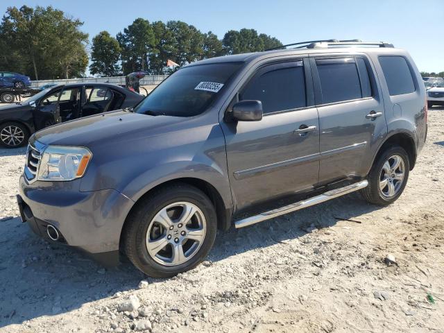 HONDA PILOT 2014 with VIN 5FNYF3H40EB005282 - Photo from auction