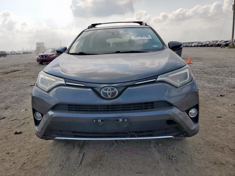 Photo 5 from auction – 2018 TOYOTA RAV4 LIMIT with VIN 2T3DFREV4JW775052