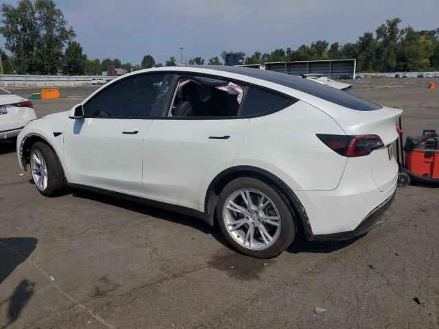 Photo 2 from auction – 2023 TESLA MODEL Y with VIN 7SAYGAEE0PF785918