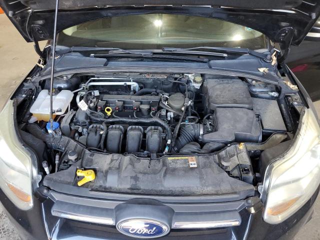 Photo 11 from auction – 2014 FORD FOCUS SE with VIN 1FADP3F27EL178233