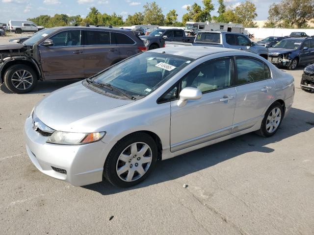 HONDA CIVIC LX 2011 with VIN 2HGFA1F52BH521947 - Photo from auction