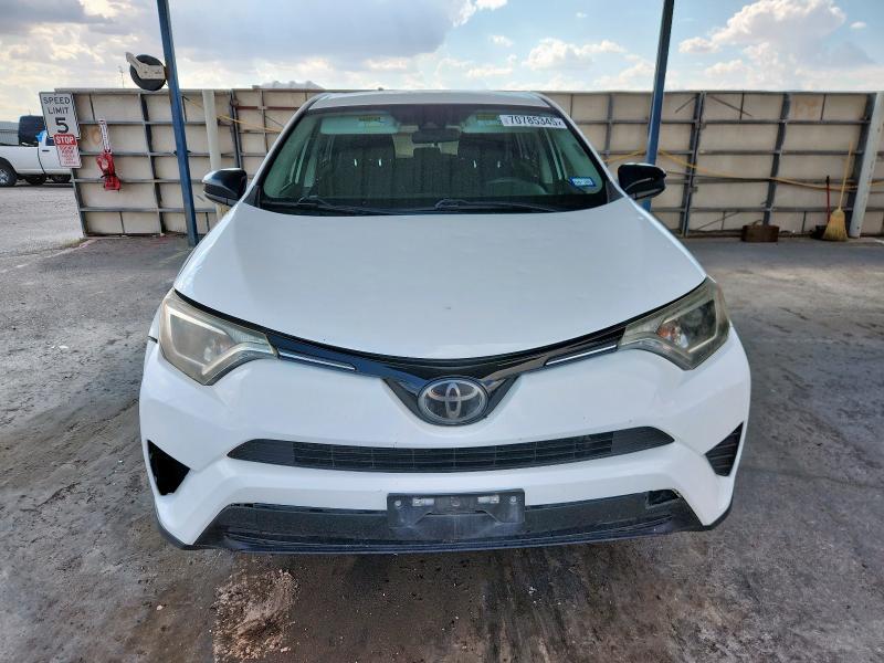 Photo 5 from auction – 2018 TOYOTA RAV4 LE with VIN 2T3ZFREV6JW416064