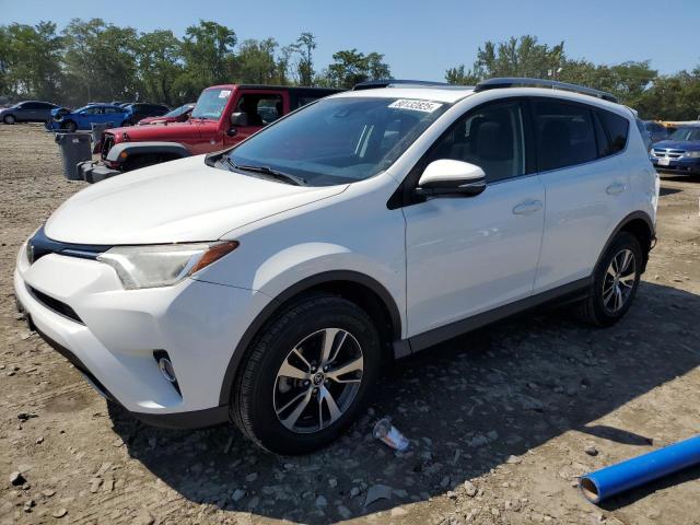 Photo 1 from auction – 2017 TOYOTA RAV4 XLE with VIN JTMRFREV7HJ147436