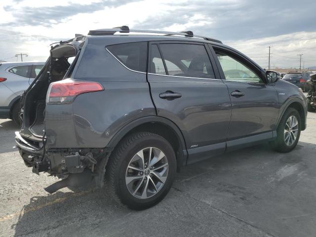 Photo 3 from auction – 2017 TOYOTA RAV4 HV LE with VIN JTMRJREV2HD070374