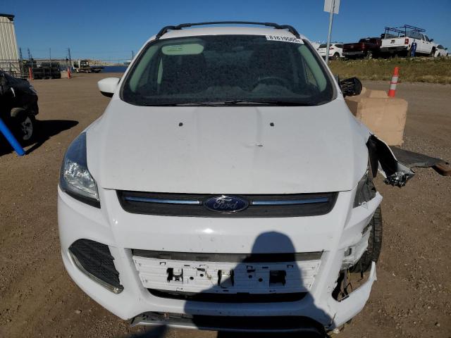 Photo 5 from auction – 2014 FORD ESCAPE SE with VIN 1FMCU9G90EUD68474