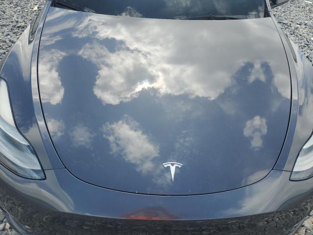 Photo 12 from auction – 2022 TESLA MODEL Y with VIN 7SAYGDEF0NF392363