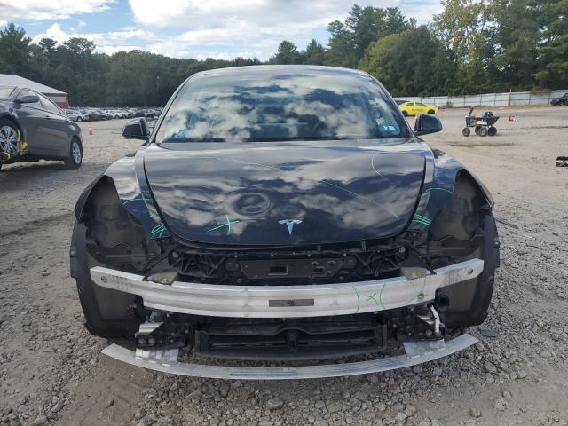 Photo 5 from auction – 2022 TESLA MODEL 3 with VIN 5YJ3E1EB1NF173887