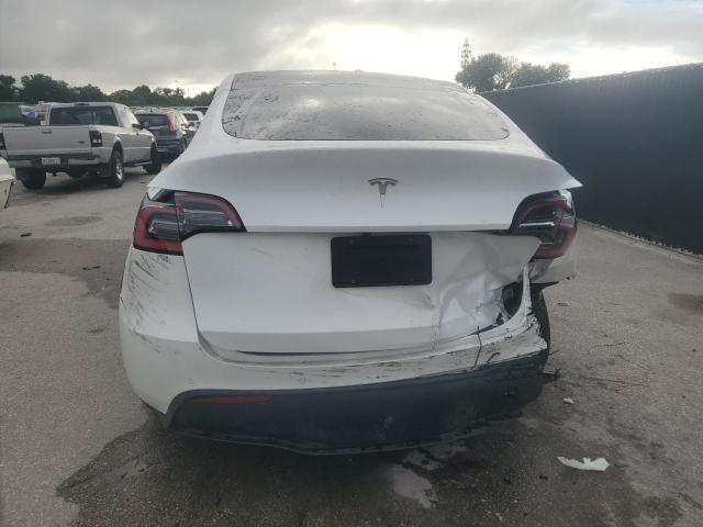 Photo 6 from auction – 2021 TESL MODEL Y with VIN 5YJYGDED3MF123400