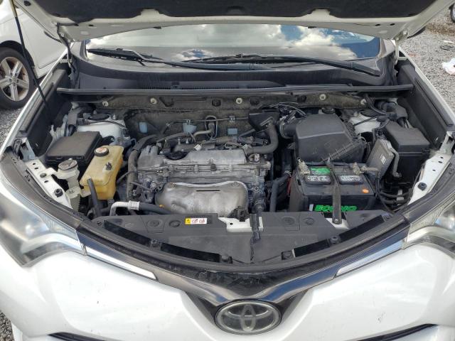 Photo 12 from auction – 2018 TOYOTA RAV4 LE with VIN JTMZFREV3JJ201823