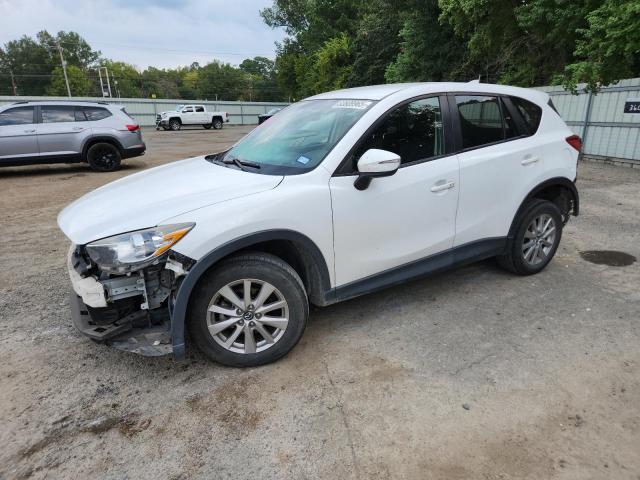 MAZDA CX-5 TOURI 2016 with VIN JM3KE2CY9G0885257 - Photo from auction