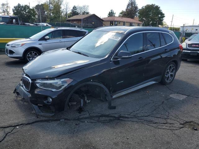 BMW X1 XDRIVE2 2017 with VIN WBXHT3C31H5F86486 - Photo from auction