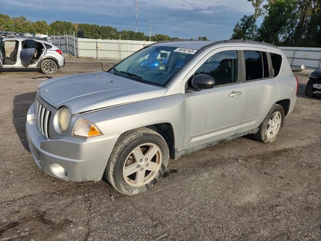 JEEP COMPASS SP 2010 with VIN 1J4NF4FBXAD519078 - Photo from auction
