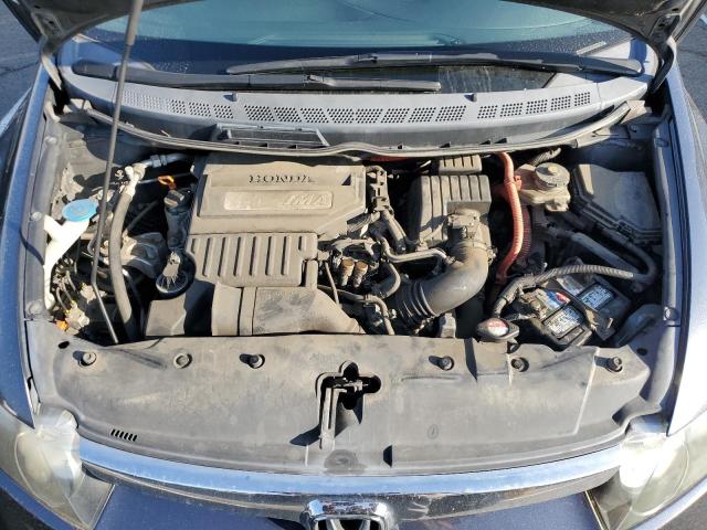 Photo 11 from auction – 2007 HONDA CIVIC HYBR with VIN JHMFA36207S001535