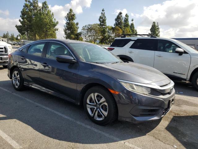 Photo 4 from auction – 2017 HONDA CIVIC LX with VIN 2HGFC2F51HH541339