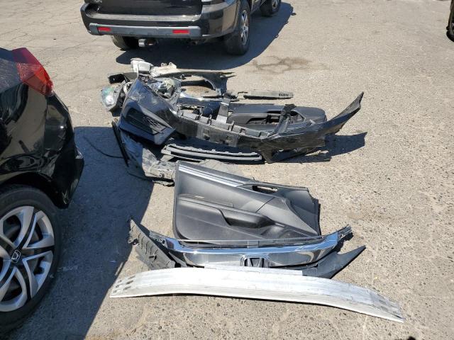 Photo 12 from auction – 2016 HONDA CIVIC LX with VIN 19XFC2F59GE012732