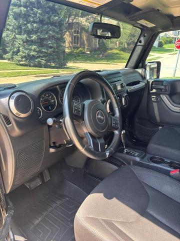 Photo 5 from auction – 2016 JEEP WRANGLER U with VIN 1C4BJWDG6GL177953